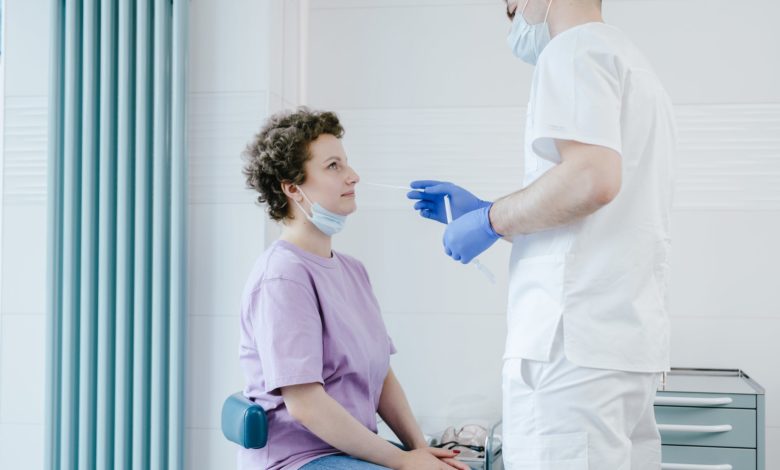 woman getting covid tested