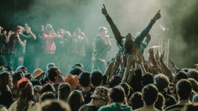 people lift a person